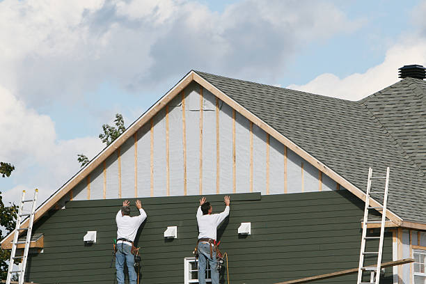 Professional Siding technician working in Rice, TX